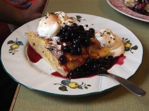 Apfelstrudel on a plate with cream