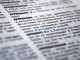 Glossary- French Real Estate Terms A close-up of a French dictionary page, focusing on entries like “APPRENANT” and “APPRENDRE.” Perfect for exploring French Real Estate Vocabulary, the black text on white paper shows bolded words and numbered explanations at a slight angle.