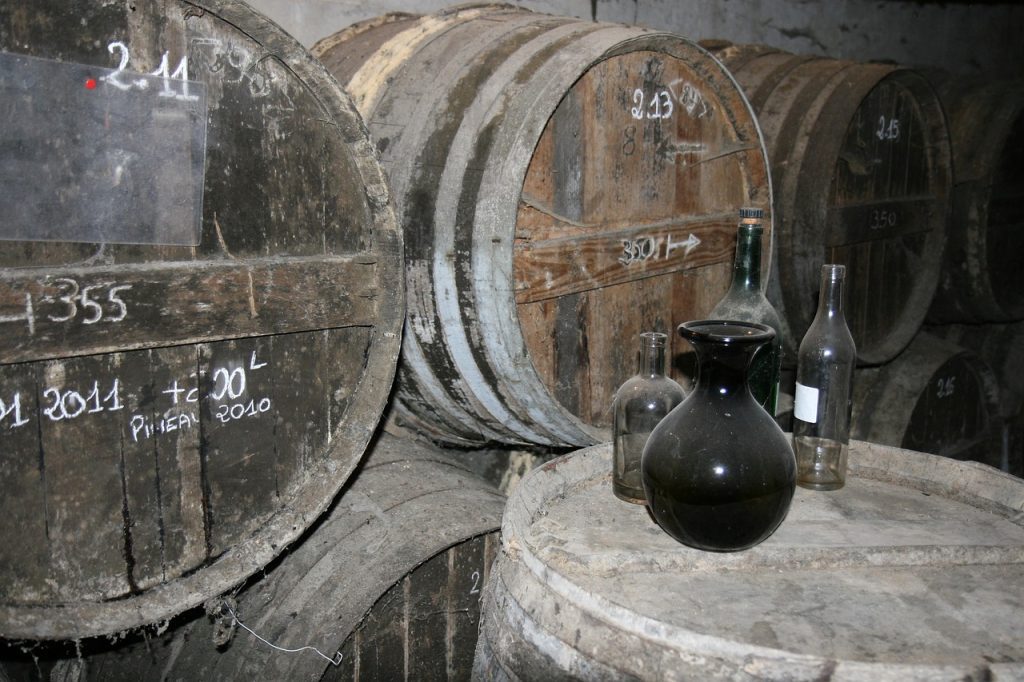 Cognac's cultural tapestry old barrels and bottles